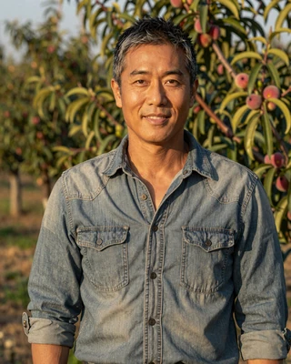 Portrait of David, a 54-year-old farmer from Fresno, CA